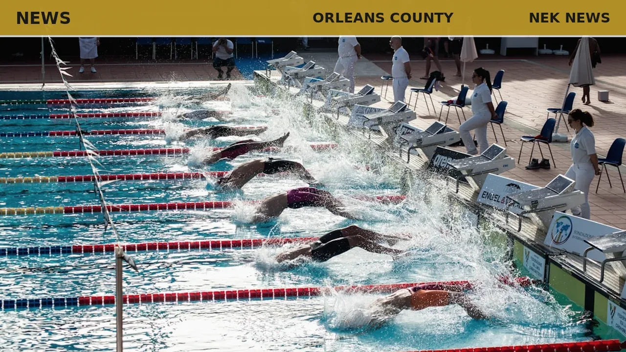 Phil White earns marathon swimming service award