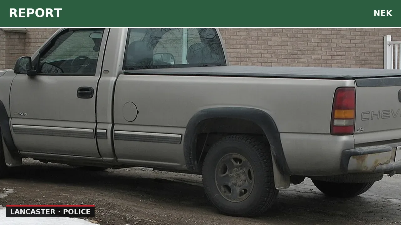 Gray Chevy pickup with lane control issues in Lancaster